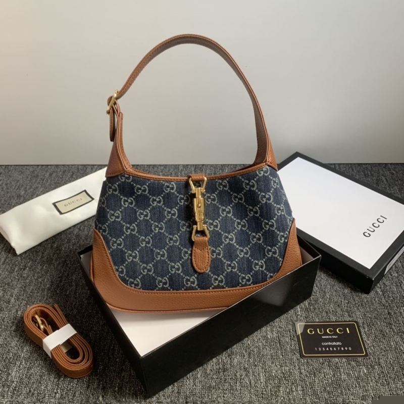 G*u*i top handle bags